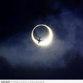 plane over an eclipse