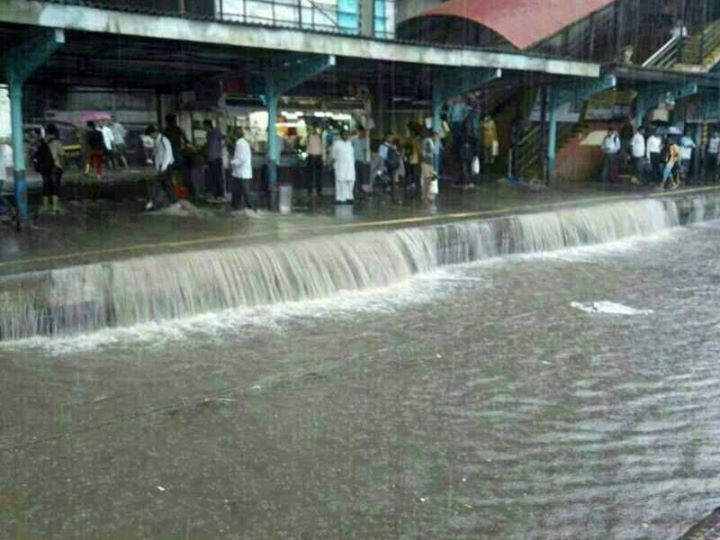 waterfall at train station in India - meme