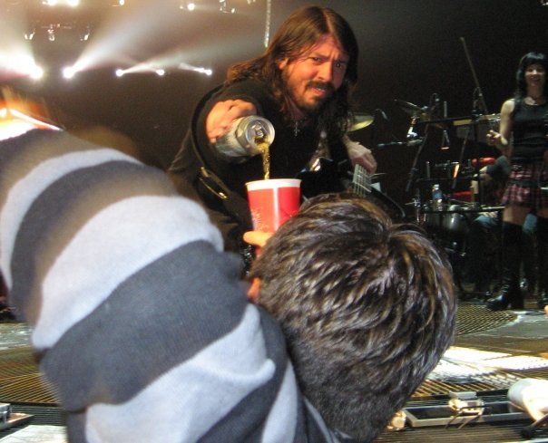 Just Dave Grohl pouring a fan some beer - meme