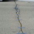 who knew duct tape can solve cracks in the street