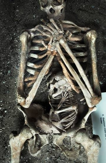 The skeleton of a mother and child who both died in her pregnancy... creepy - meme