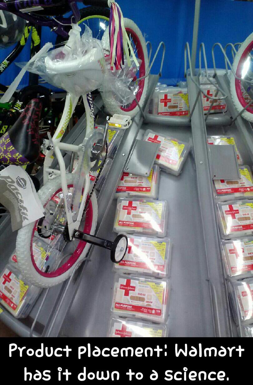 First aid kits next to children's bikes.. GENIUS!! - meme