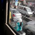 using laptop in traffic like a boss! only in India. lol