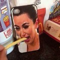 Kim won't eat her fry. I bet If it was black she would.