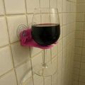 Wine glass holder for the bathroom