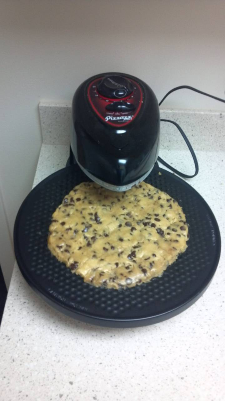 Massive cookie made on a pizzazz. - meme