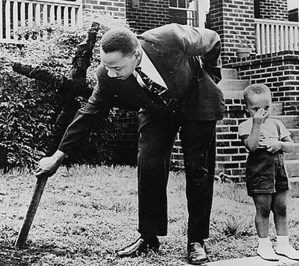 MLK removing a burnt cross from his lawn. - meme